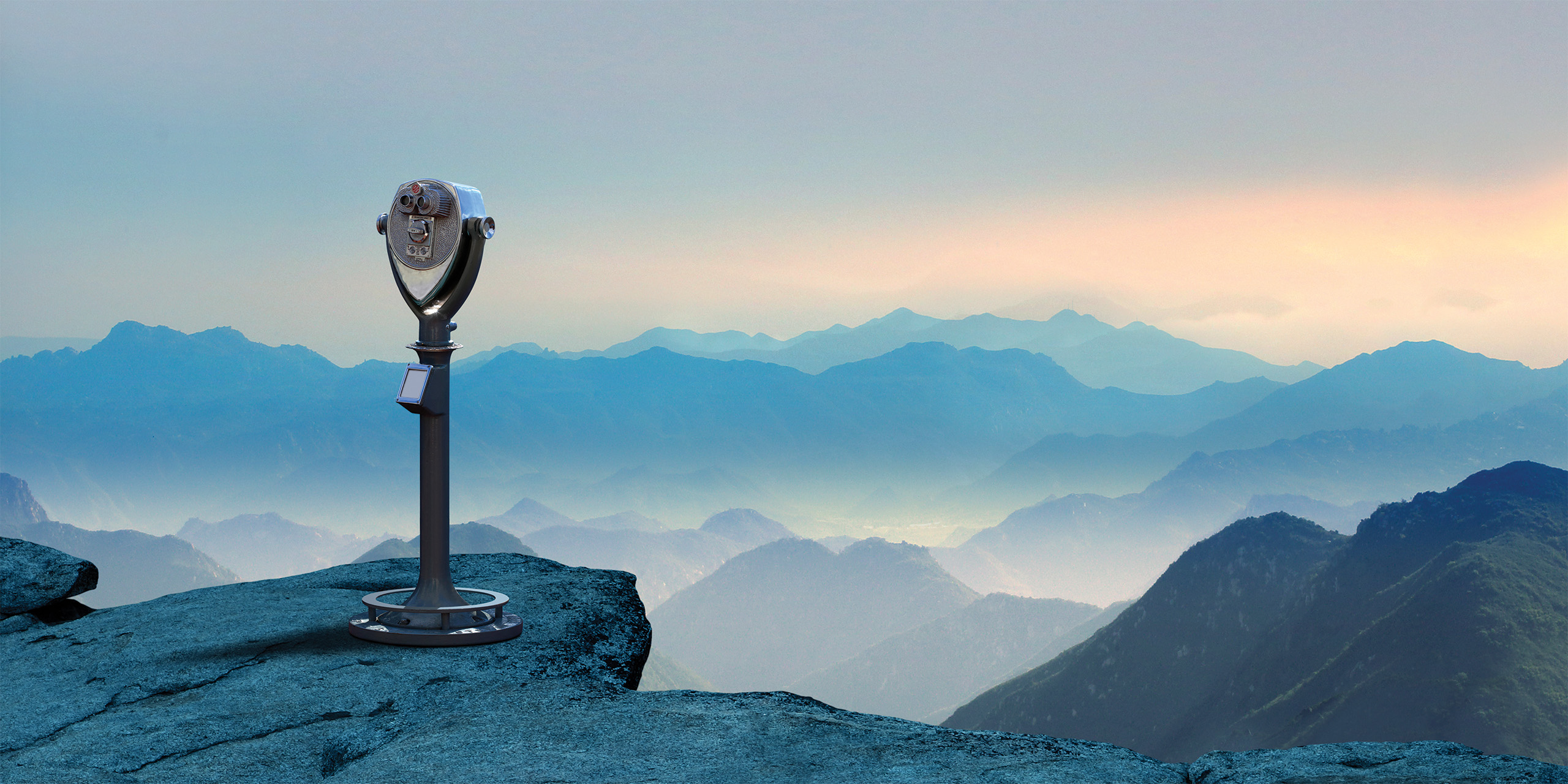 Image of a telescope overlooking a mountain range